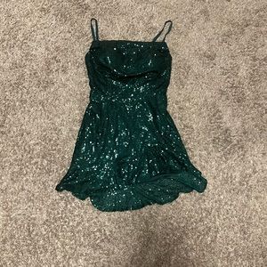 A mini cocktail dress, Emerald green with sparkles